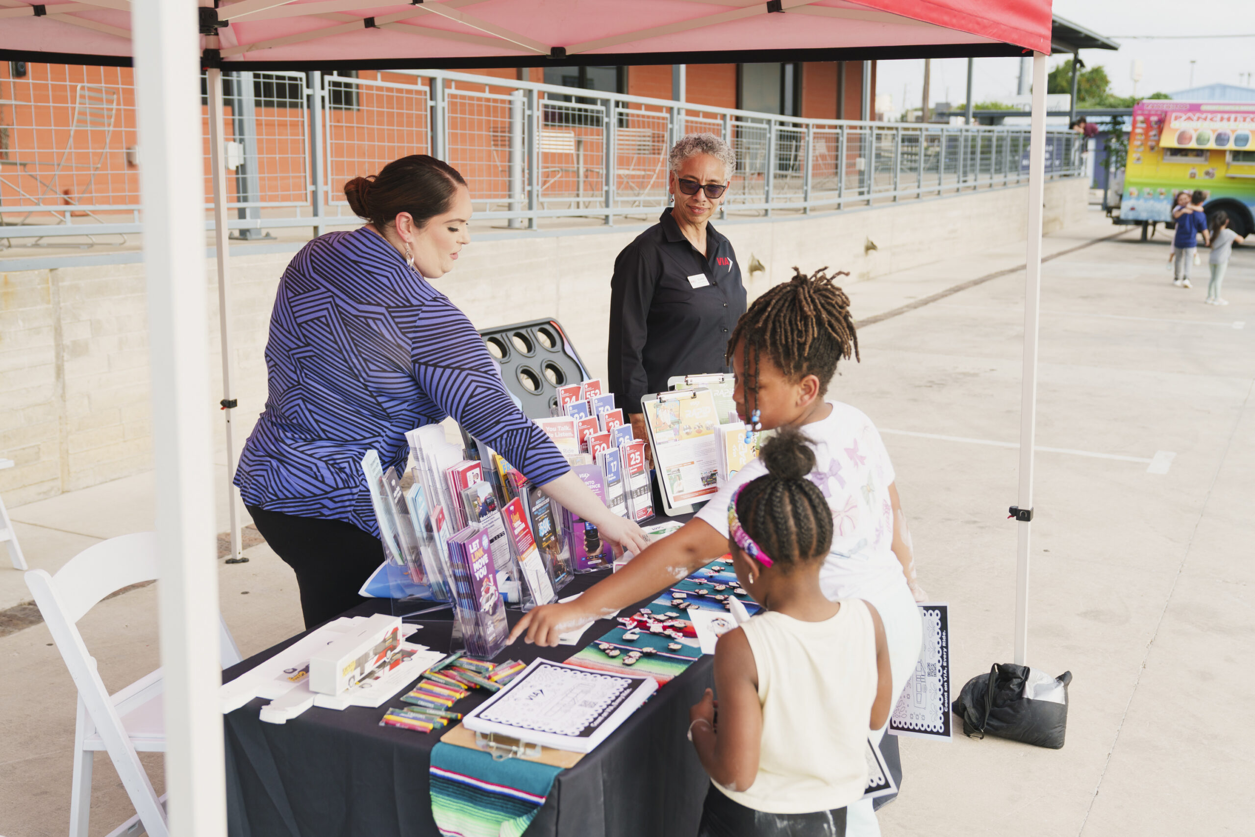 Fresh produce and community resources at VelocityTX Movie Night